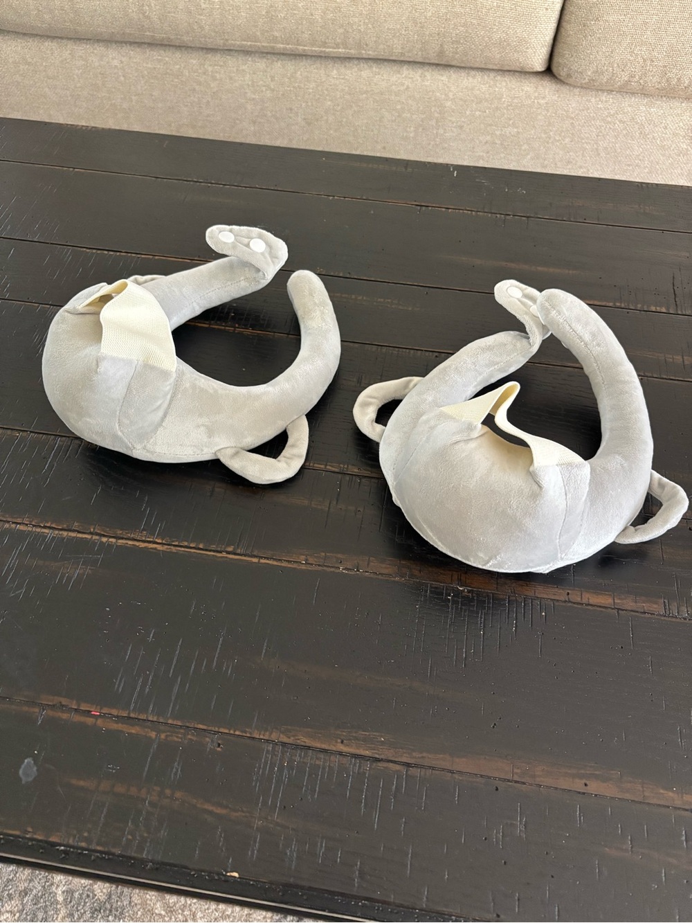 Grey baby bottle holders for feeding